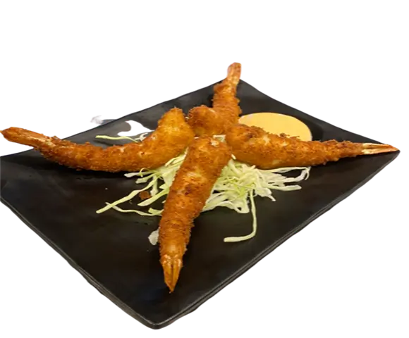 Fried Prawns are large, crispy fried prawns served on a bed of shredded cabbage, accompanied by a side of dipping sauce at Torakichi Ramen, a Japanese Ramen restaurant in Palm Springs